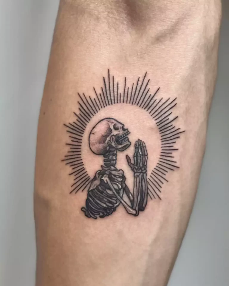 sun tattoo with skeleton