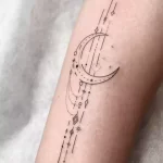 crescent moon and stars fine line tattoo