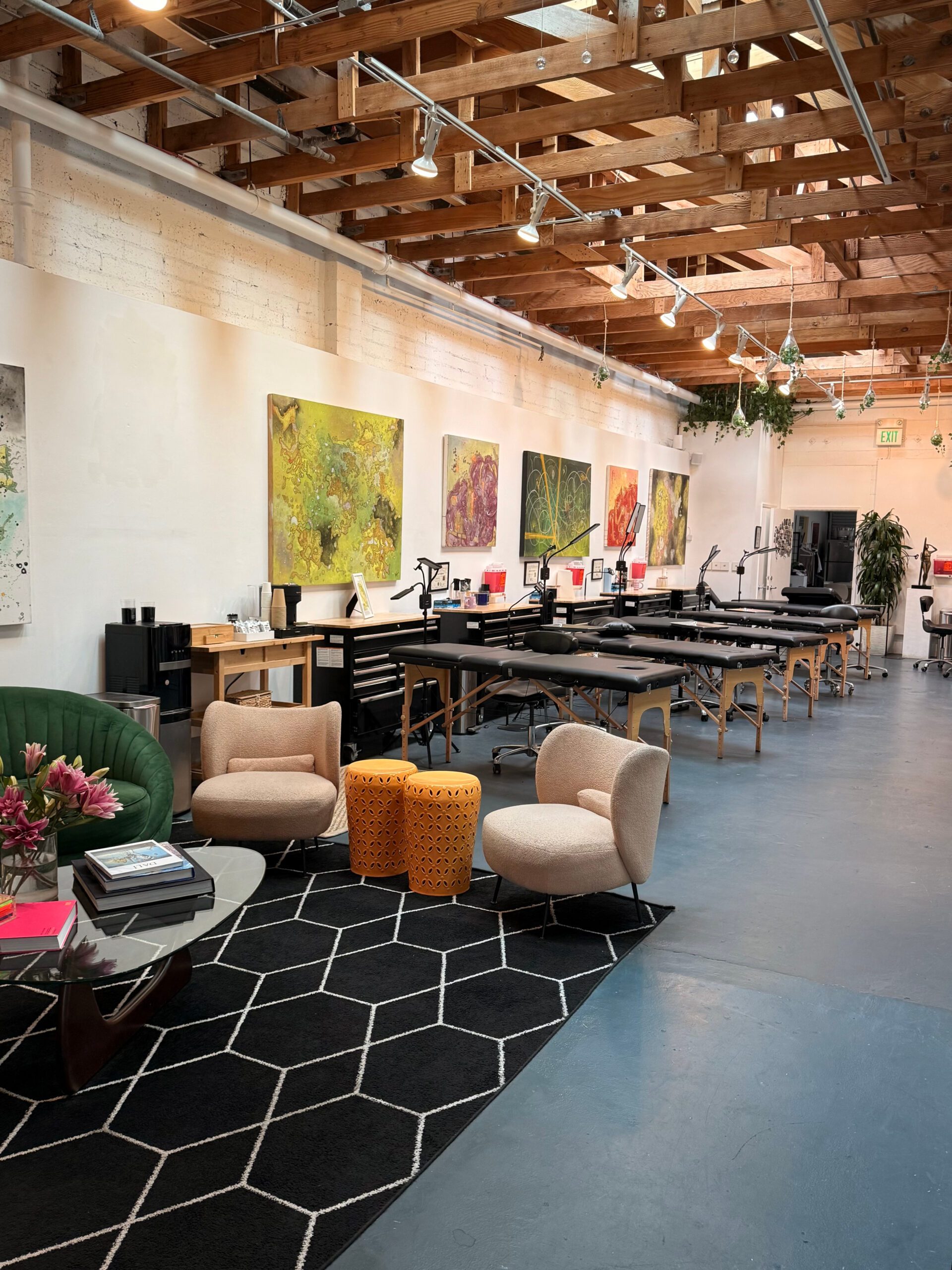 Interior of Alium Tattoo Studio in Los Angeles showing clean and artistic tattoo workspace