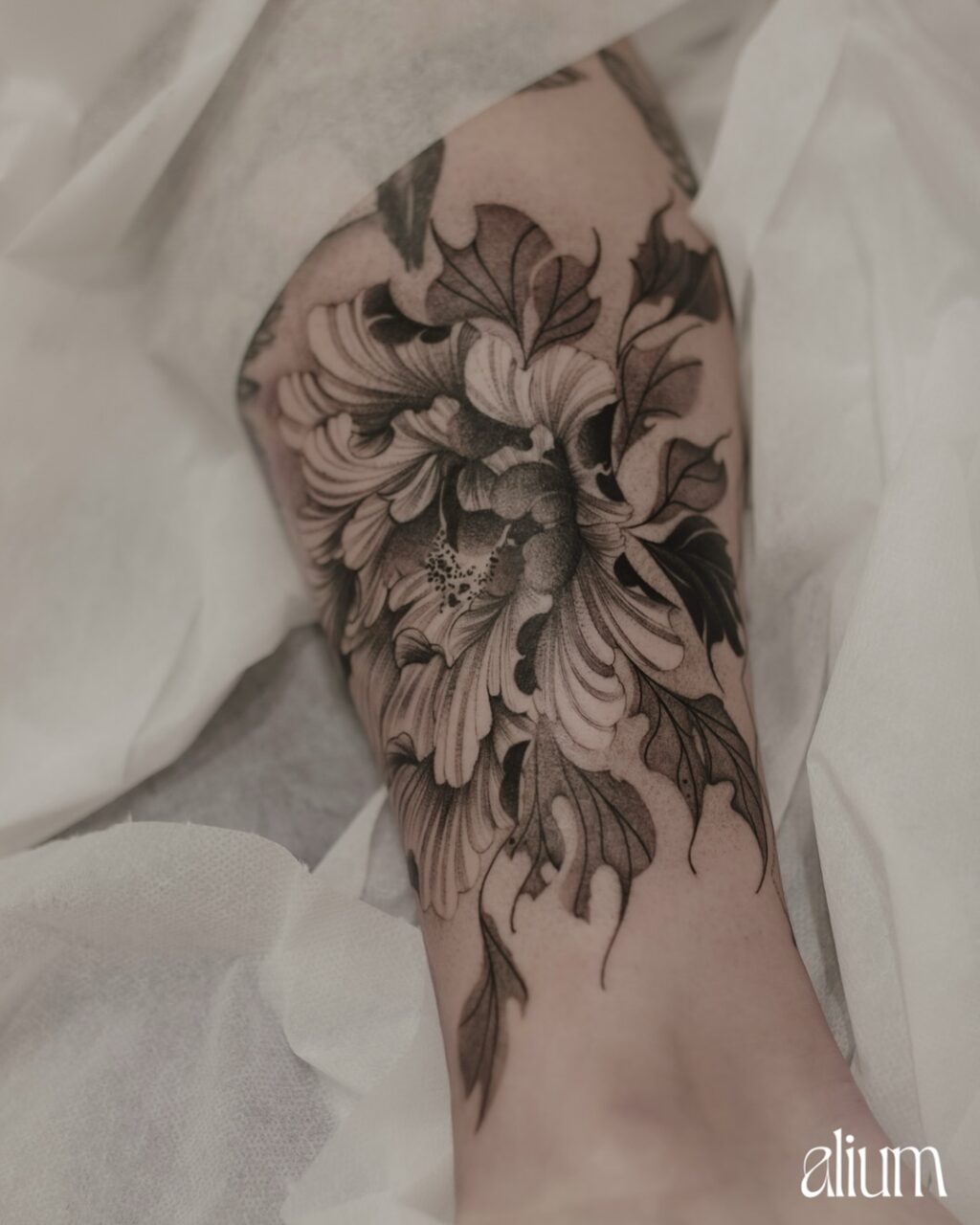 Instagram post from aliumtattoostudio. This post is in position 0.