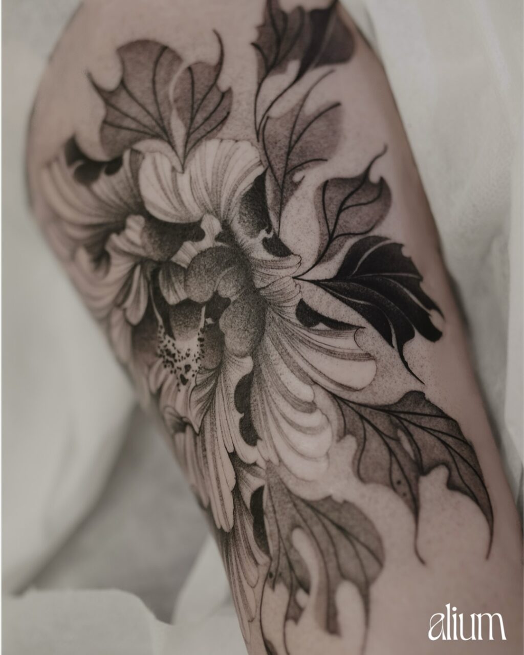 Instagram post from aliumtattoostudio. This post is in position 1.